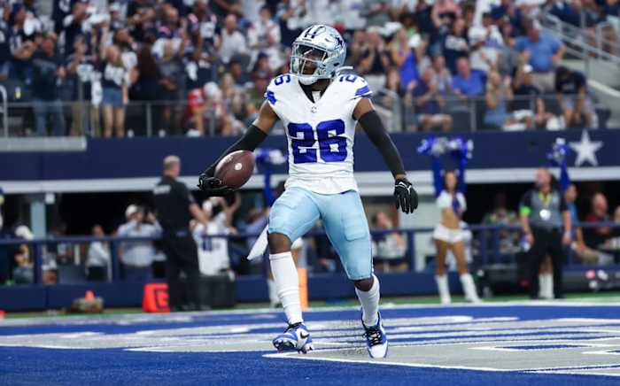 Dallas Cowboys cornerback DaRon Bland celebrates in the endzone after a pick-six.
